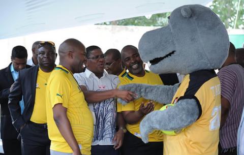 Afcon mascot Takuma shakes hands with Minister of Sport and Recreation, Fikile Mbalula. Source: GCIS