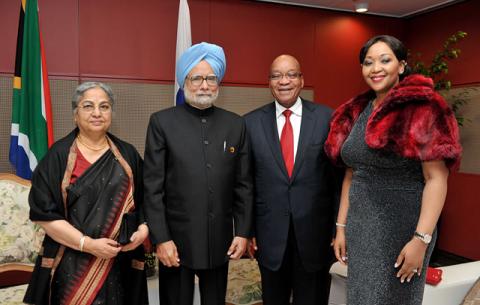 President Zuma and his wife Thobeka Zuma welcome Indian Prime Minister Manmohan Singh and his wife Gursharan Kaur before the start of the cultural evening marking the official opening of the 5th BRICS summit held at Inkosi Luthuli International Conference Centre in Durban. Source: GCIS