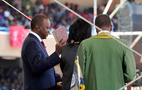 President elect Uhuru Kenyatta taking the oath of office during the inauguration ceremony held at the Kasarani sports complex in Nairobi. Source: GCIS
