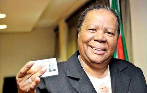 Minister of Home Affairs Naledi Pandor with her smart ID card. Source: GCIS