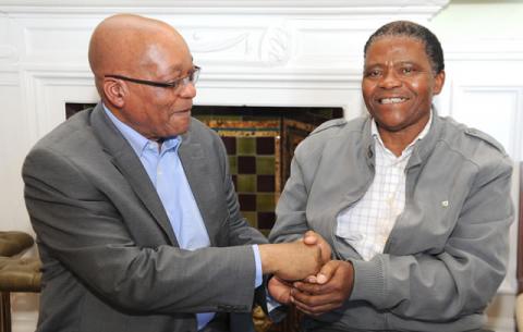 President Zuma shares a light moment with Joseph Shabalala, leader of Grammy award-winning musical group Ladysmith Black Mambazo. Shabalala is one of the President's special guests to SONA 2014. Source: GCIS
