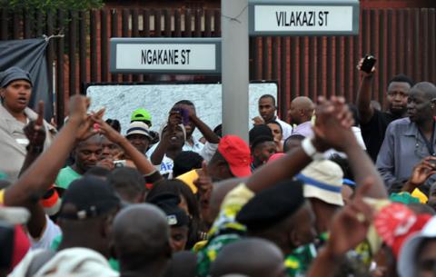 People gather at Madiba's old house in Vilakazi Street, Soweto. Source: GCIS