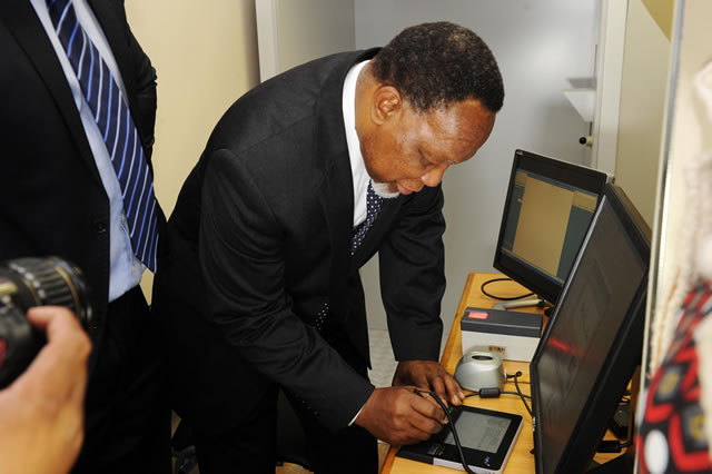 Deputy President Kgalema Motlanthe applies for a Smart Identity Card at Byron House in Pretoria ahead of the official launch on Nelson Mandela Day. Source: GCIS