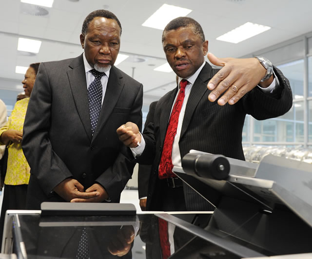 Minister of Home Affairs Naledi Pandor, Deputy President Kgalema Motlanthe and Chief executive Officer of GPW Prof. Anthony Mbewu inspecting equipment to be used for producing Smart Identity Cards at Government Printing Works in Pretoria ahead of the official launch on Nelson Mandela Day. Source: GCIS