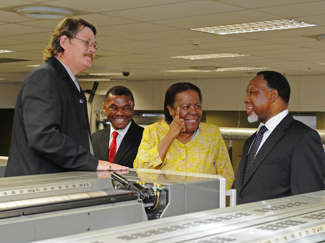 Minister of Home Affairs Naledi Pandor, Deputy President Kgalema Motlanthe and Chief executive Officer of GPW Prof. Anthony Mbewu inspecting equipment to be used for producing Smart Identity Cards at Government Printing Works in Pretoria ahead of the official launch on Nelson Mandela Day. Source: GCIS