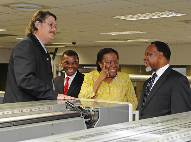 Minister of Home Affairs Naledi Pandor, Deputy President Kgalema Motlanthe and Chief executive Officer of GPW Prof. Anthony Mbewu inspecting equipment to be used for producing Smart Identity Cards at Government Printing Works in Pretoria ahead of the official launch on Nelson Mandela Day. Source: GCIS