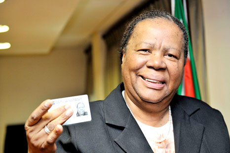 Minister of Home Affairs Naledi Pandor with her smart ID card. Source: GCIS