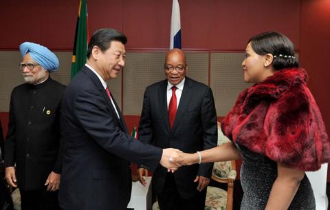 Chinese President Xi Jinping greets Thobeka Zuma and President Zuma before the start of the cultural evening marking the official opening of the 5th Brics summit held at Inkosi Luthuli International Conference Centre in Durban. Source: GCIS