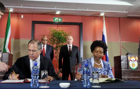 International Relations Minister Maite Nkoana-Mashabane signs a programme of cooperation on cultural projects with Minister Lavron at the Durban ICC. Source: GCIS