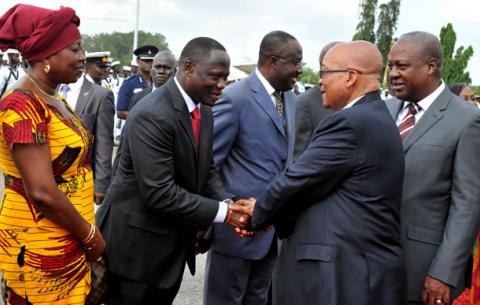 President Zuma and Ghanaian President Dramani Mahama shaking hands with the Ghanaian delegation at the end of his State Visit in Ghana. Source: GCIS