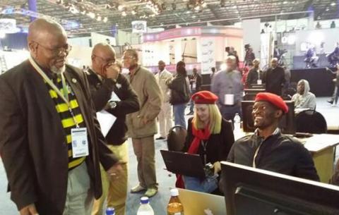 ANC secretary-general Gwede Mantashe speaks to EFF members at the IEC Results Centre in Pretoria. Source: SAnews