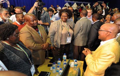 President Zuma chatting with UDM leader Bantu Holomisa. Source: GCIS