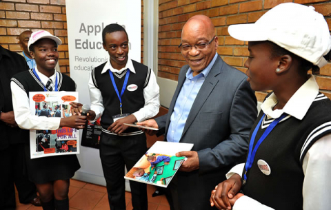 President Zuma receives presents from school children Fawcett Chabalala, Casey Shivambu and Sharon Mathebula during his visit to Muyexe village in Giyani, Limpopo. Source: GCIS