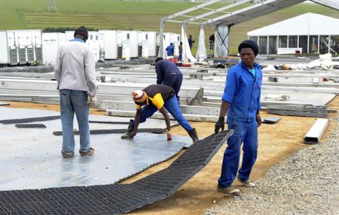 Men working at the site where Madiba's funeral will be held in Qunu. Source: GCIS