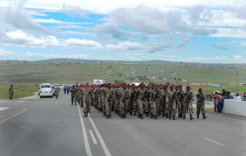 Members of the South African National Defence Force preparing for the funeral of former President Nelson Mandela in Qunu. Source: GCIS