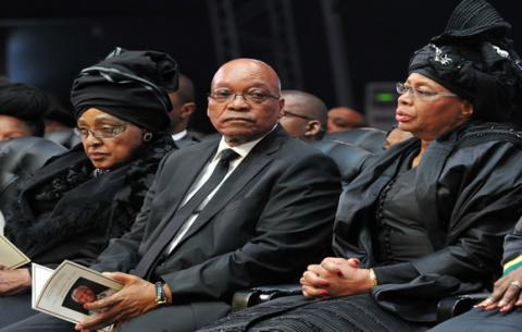 President Jacob Zuma with Winnie Mandela, Graca Machel at the funeral service of the Mandela. Source:GCIS