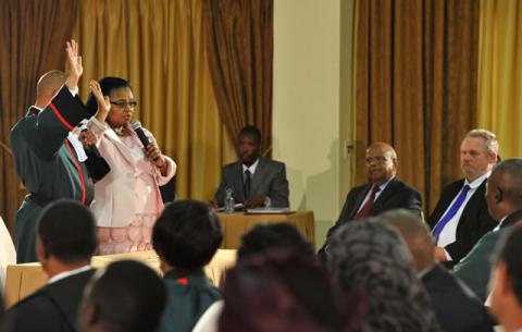 Minister of Environmental Affairs Edna Molewa being sworn in by Chief Justice Mogoeng Mogoeng. Source: GCIS