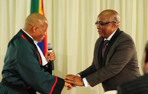 Minister of Health Dr Aaron Motsoaledi being sworn in by Chief Justice Mogoeng Mogoeng. Source: GCIS