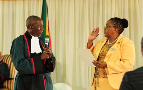 Minister of Transport Dipuo Peters being sworn in by Deputy Chief Justice Dikgang Moseneke. Source: GCIS