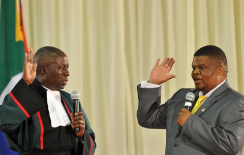 State Security Minister David Mahlobo being sworn in by Deputy Chief Justice Dikgang Moseneke. Source: GCIS