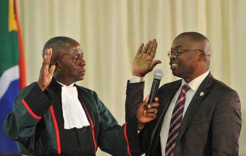 Justice and Correctional Services Minister Michael Masutha being sworn in by Deputy Chief Justice Dikgang Moseneke. Source: GCIS