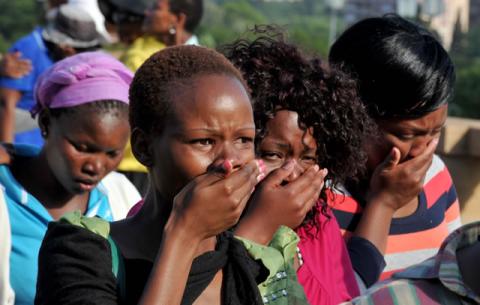 Members of the public after viewing Mandela's remains, who is lying in state at the Union Buildings. Source: GCIS