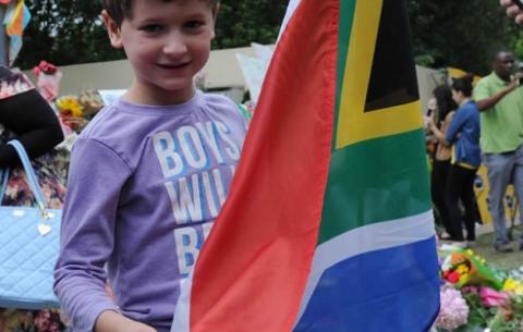 South Africans from all walks of life and ages came to lay flowers and show their support outside Madiba’s house in Houghton. Source: GCIS