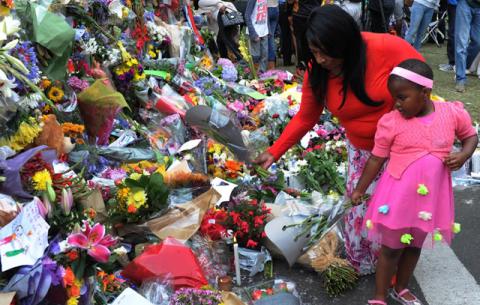 South Africans from all walks of life and ages came to lay flowers and show their support outside Madiba’s house in Houghton. Source: GCIS