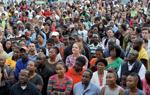 People from all walks of life gather to pay tribute to Mandela. Source: GCIS