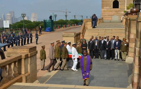 Members of the SANDF take Madiba's remains up to the Amphitheatre at the Union Buildings. Source: GCIS