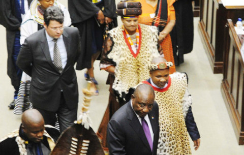 President Ramaphosa walks into the National House of Traditional Leaders. 