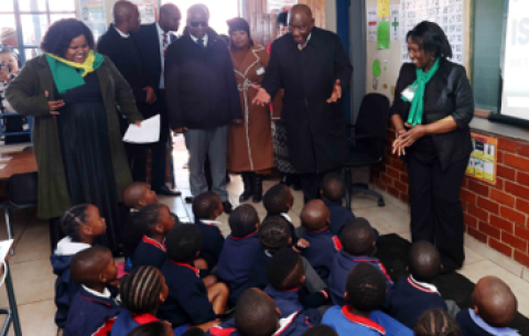 President Cyril Ramaphosa, accompanied by the Minister of Basic Education, Siviwe Gwarube, interacts with Grade R learners during the Presidential Youth Flagship Programmes at Sefako Makgatho Primary School in Pretoria.