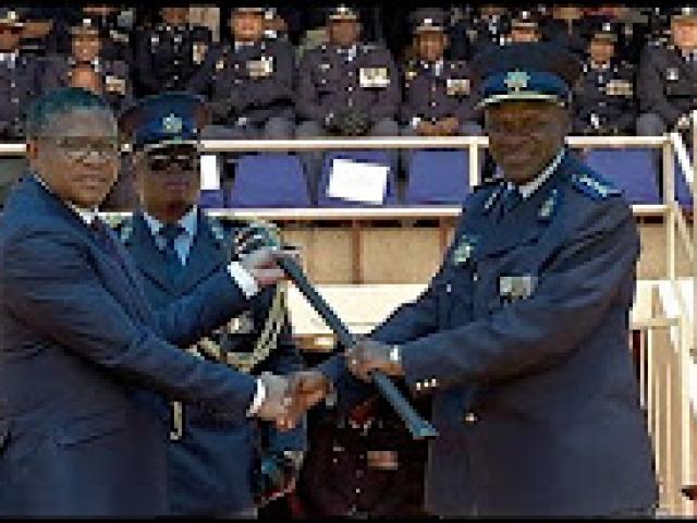 Minister Fikile Mbalula bestows the Sword of Command to the newly appointed National Commissioner 