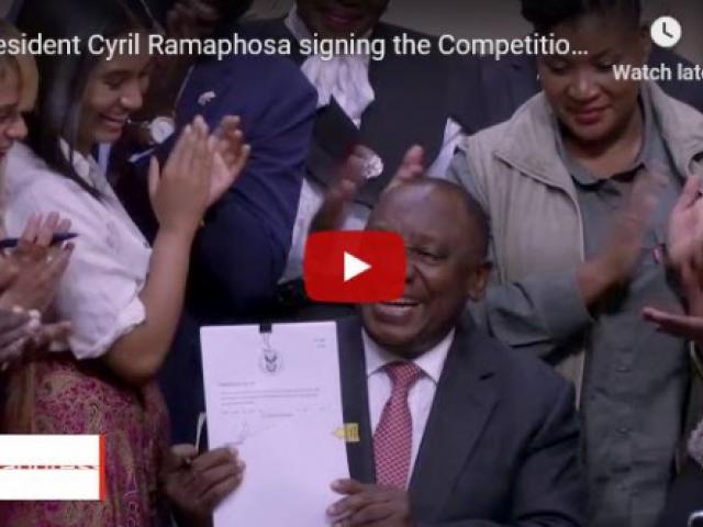 President Cyril Ramaphosa signing the Competition Amendment Bill into law