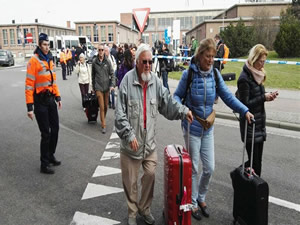 People are evacuated from the Brussels airport in Brussels, Belgium, on 22 March 2016. Source: Xinhua/Gong Bing