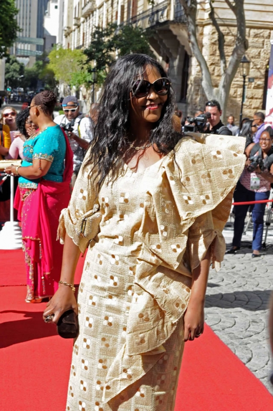 Bukelwa Holomisa arrives at the Poorthuys entrance to the Old Assembly building. Source: GCIS