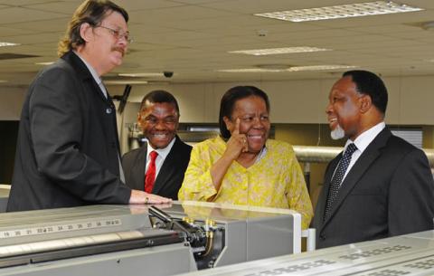 Minister of Home Affairs Naledi Pandor, Deputy President Kgalema Motlanthe and Chief executive Officer of GPW Prof. Anthony Mbewu inspecting equipment to be used for producing Smart Identity Cards at Government Printing Works in Pretoria ahead of the official launch on Nelson Mandela Day. Source: GCIS