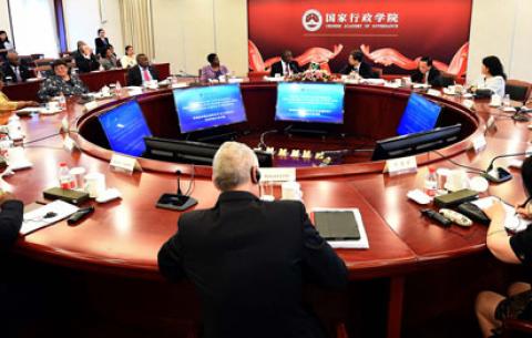 Deputy President Cyril Ramaphosa and Executive President of the Chinese Academy of Governance, Ma Jiantang in Beijing, China