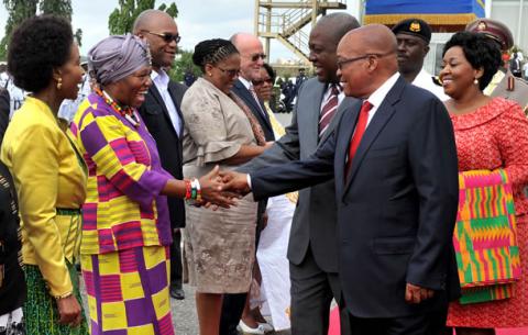President Zuma and Ghanaian President Dramani Mahama shaking hands with SA High Commissioner to Ghana Jeanett Ndlovu and the SA delegation at the end of the State visit in Ghana. Source: GCIS