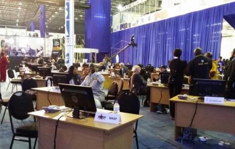 Various political party representatives glued to the leader board. SAnews