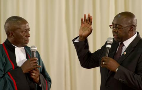 Finance Minister Nhlanhla Nene being sworn in by Deputy Chief Justice Dikgang Moseneke. Source: GCIS