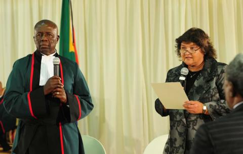 Minister of Public Enterprises Lyn Brown being sworn in by Deputy Chief Justice Dikgang Moseneke. Source: GCIS