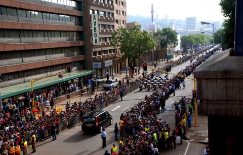 Mandela's coffin passing Madiba street to Union Buildings. Source: GCIS
