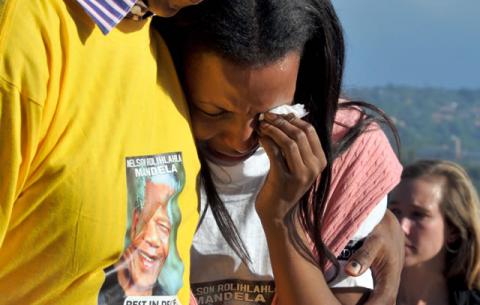 Members of the public after viewing Mandela's remains, who is lying in state at the Union Buildings. Source: GCIS