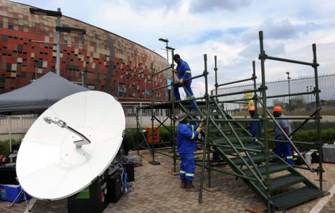Workers at FNB Stadium preparing for the memorial. Source: GCIS