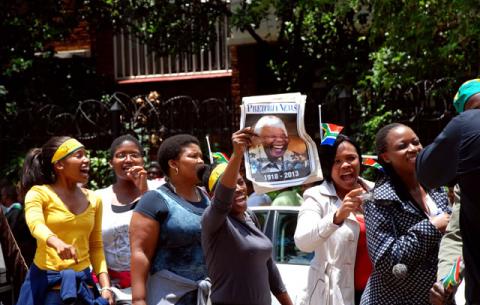 Members of the public waiting to board a bus to go see Madiba's remains at the Union Buildings. Source: GCIS