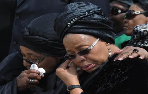 Winnie Madikizela Mandela and Graca Machel at Mthatha Airport during Madiba's remains' arrival. Source: GCIS