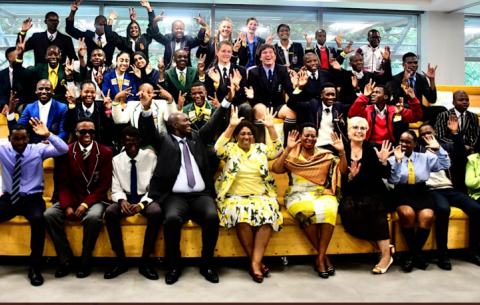 Basic Education officials with the top achievers of the Class of 2022.