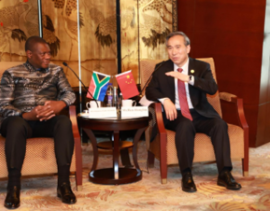 Deputy President Paul Mashatile with Ren Hongbin, chair of the China Council for the Promotion of International Trade.