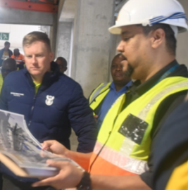 Macpherson on a site visit during SIDSSA 2026.